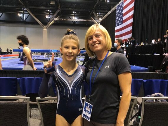 Coach Natalia and a student at championships cropped.