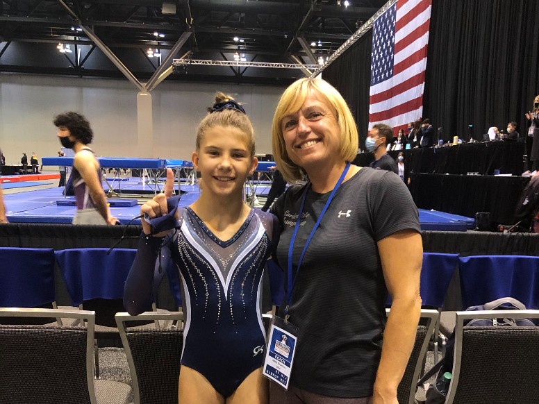 Coach Natalia and a student at championships cropped.